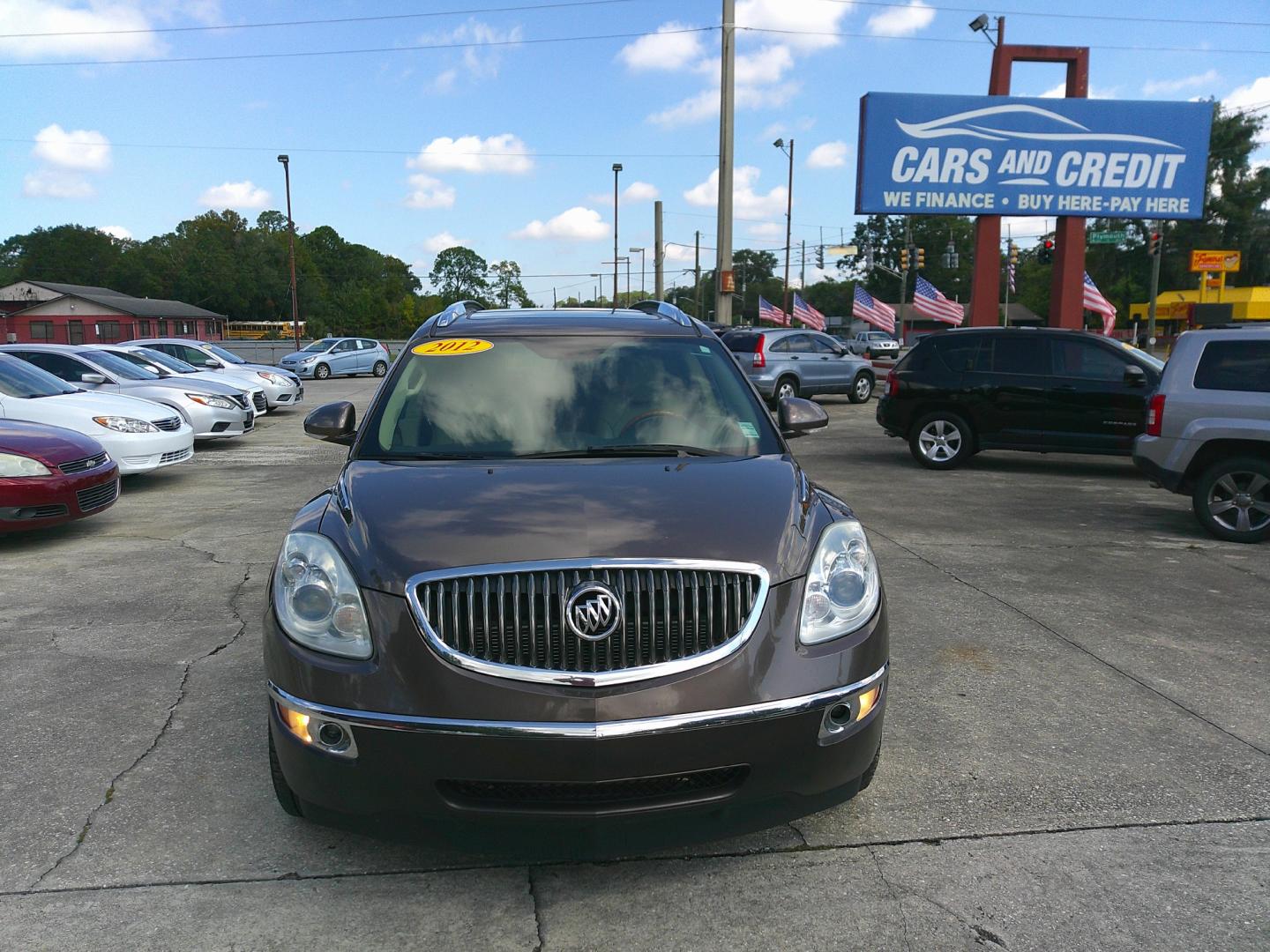 2012 BROWN BUICK ENCLAVE PREMIUM (5GAKRDED3CJ) , located at 1200 Cassat Avenue, Jacksonville, FL, 32205, (904) 695-1885, 30.302404, -81.731033 - Photo#0